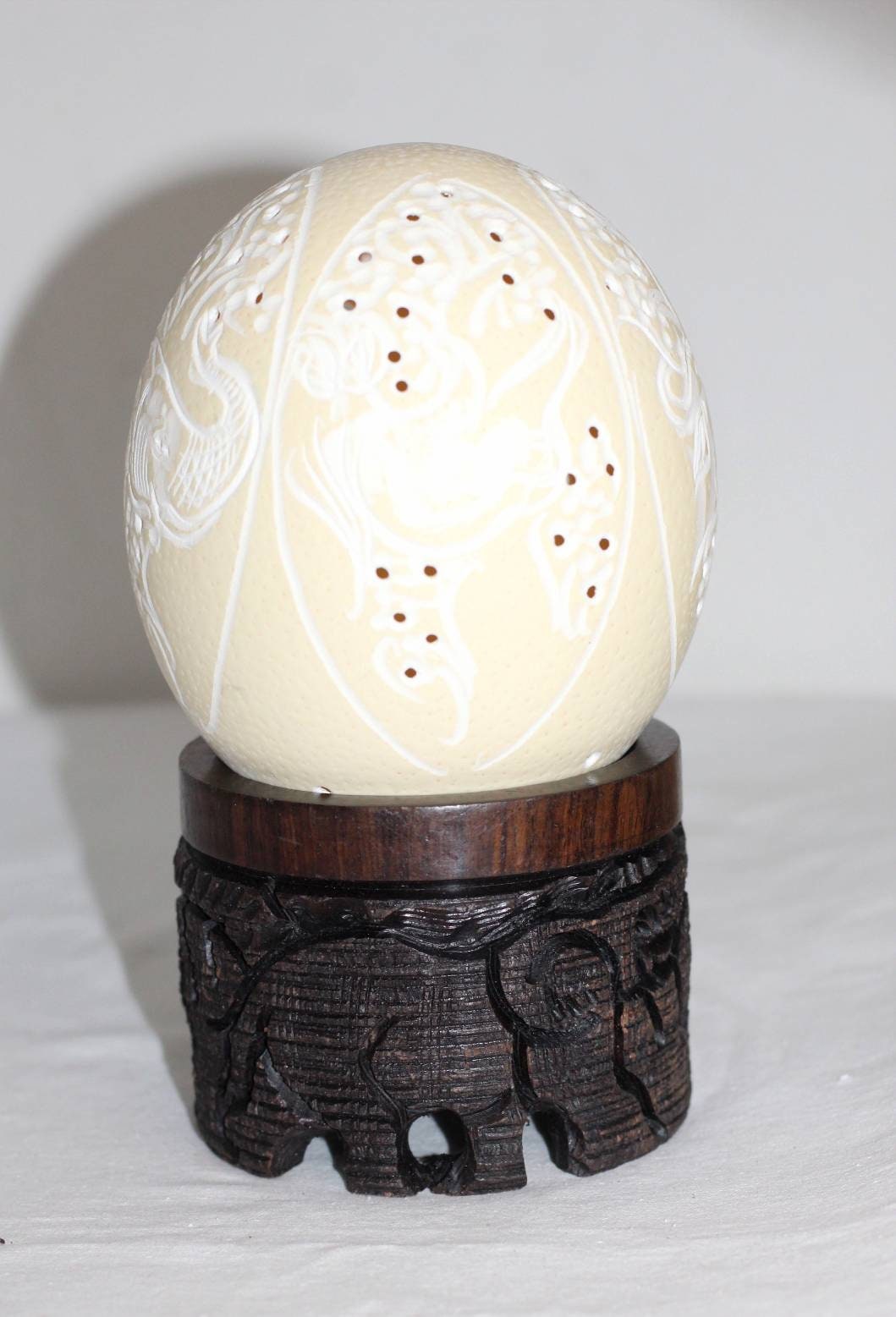 African Big Five Hand carved on an Authentic Ostrich Egg Shell lampshade. Each animal in an Oval shape, creating a star from the top view.