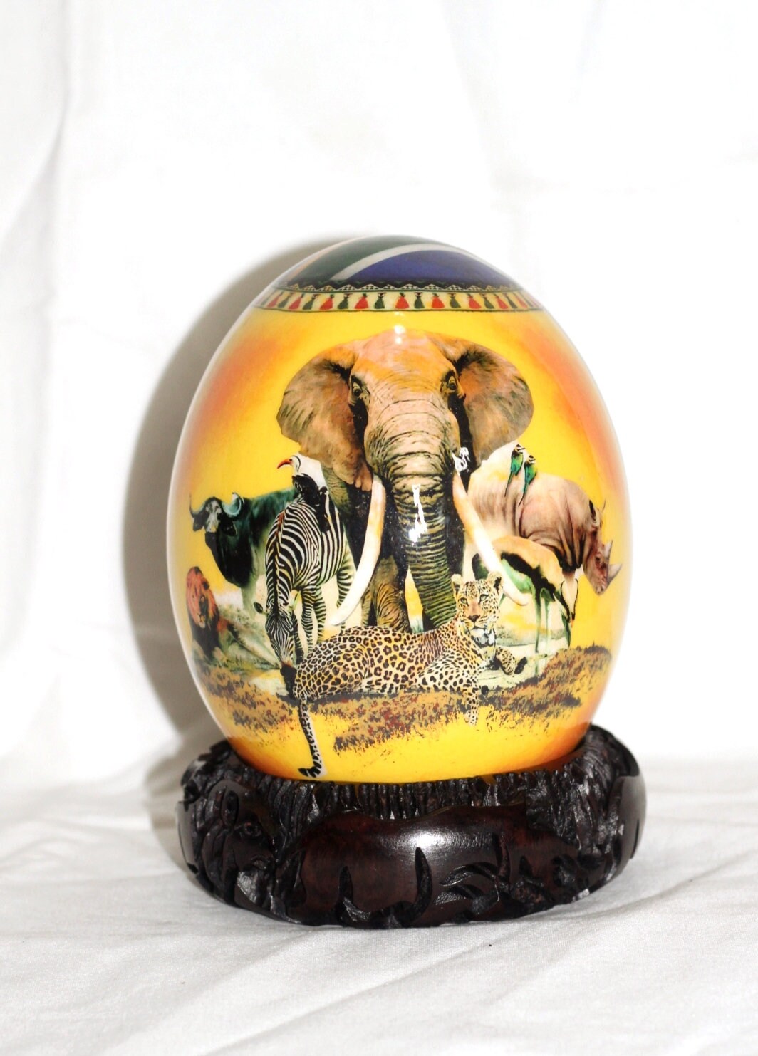 African Big Five Decoupage Shell. Ostrich Egg African Warriors, Map and a South African flag on a yellow /orange background. Christmas Gifts