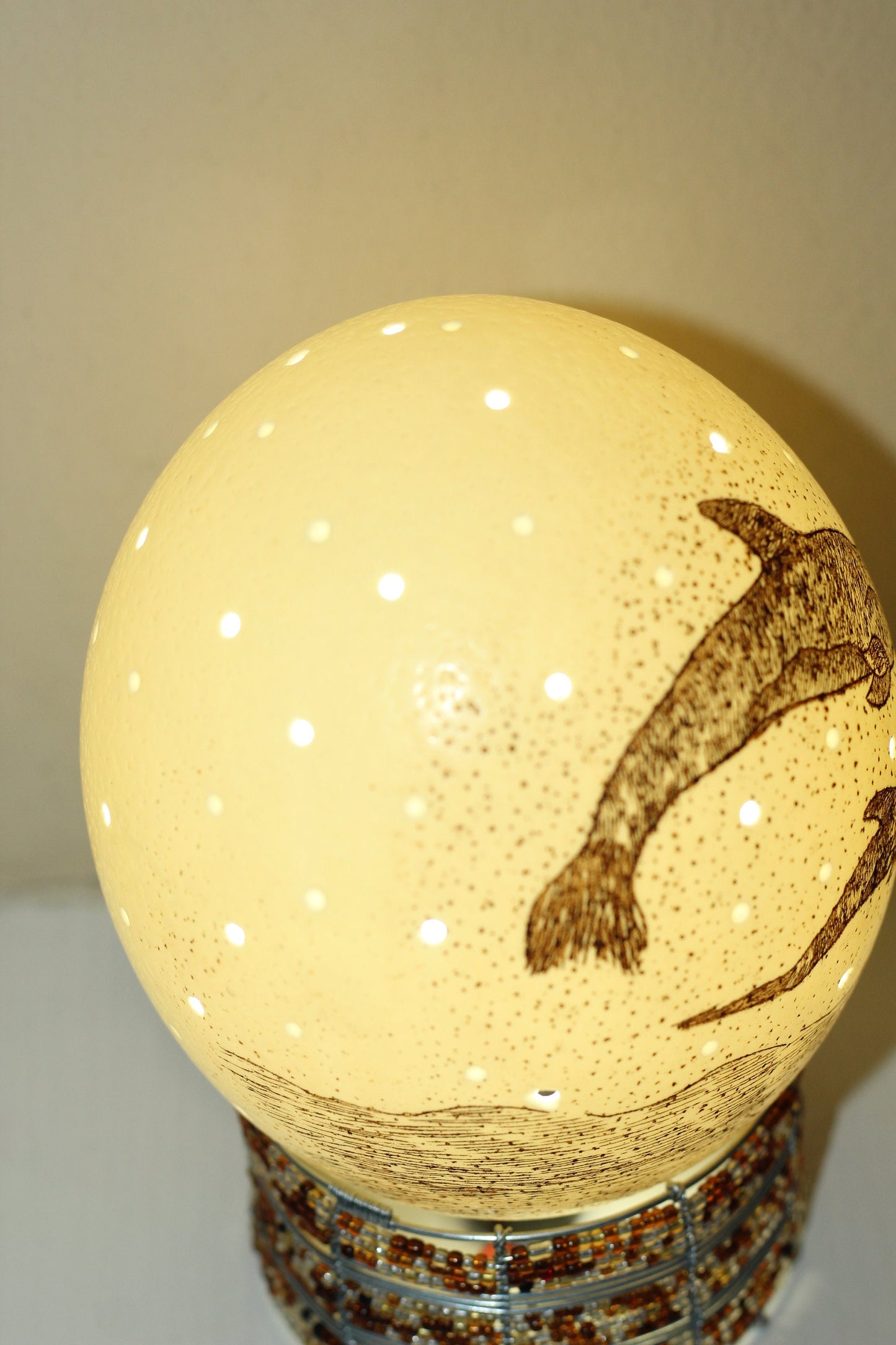 Scrimshaw Carved Dolphin and Calf on an Authentic Ostrich Egg lampshade with Holes. African art Ready to Ship Gift. Beads lampstand optional
