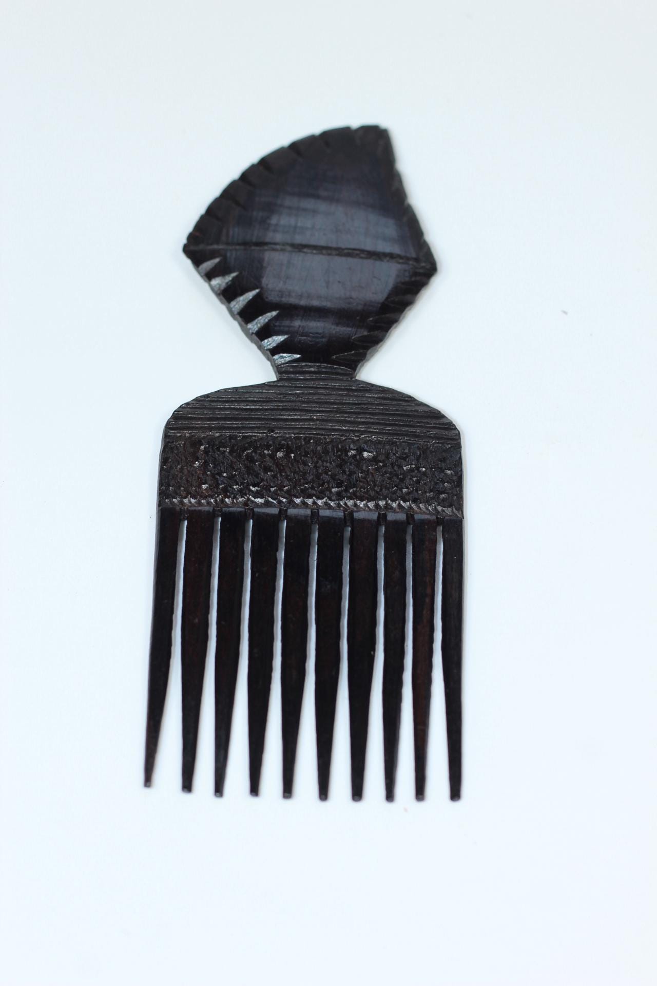 Ebony wood Carved Afro Comb. Unique African comb, Express Shipping Worldwide. Used in the olden days as a symbol of love. Engagement gifts