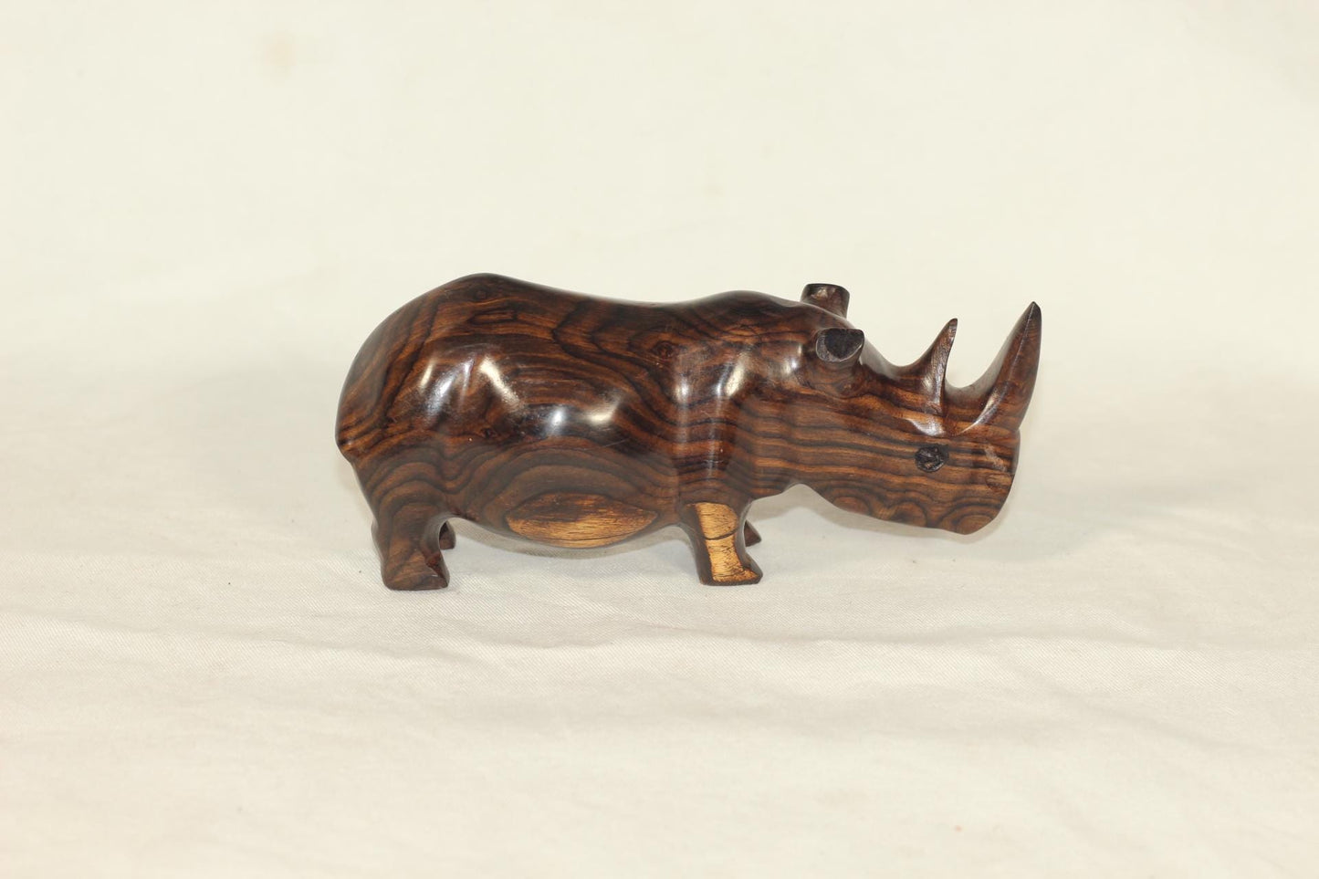 17×8cm Zambian Ebony wood handcarved Rhino. Unique African Art Gifts, for home and office decor. Amazing Wood grain on Rhinoceros figurine.