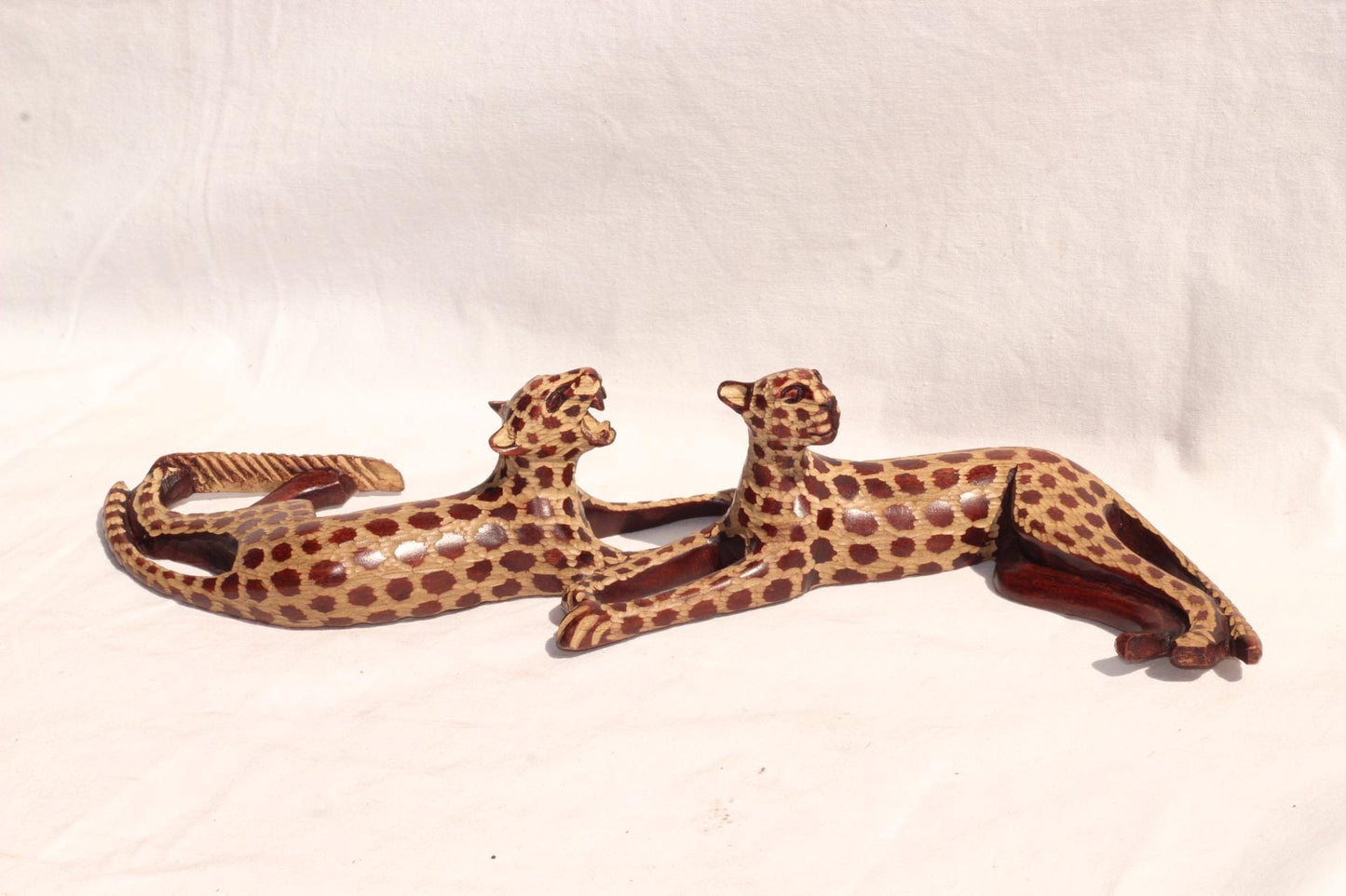 Sleeping Leopard Male and Female. Inner Olive wood dark brown polished and gouged spotted hand carved big cat Sculptures. African art Gifts