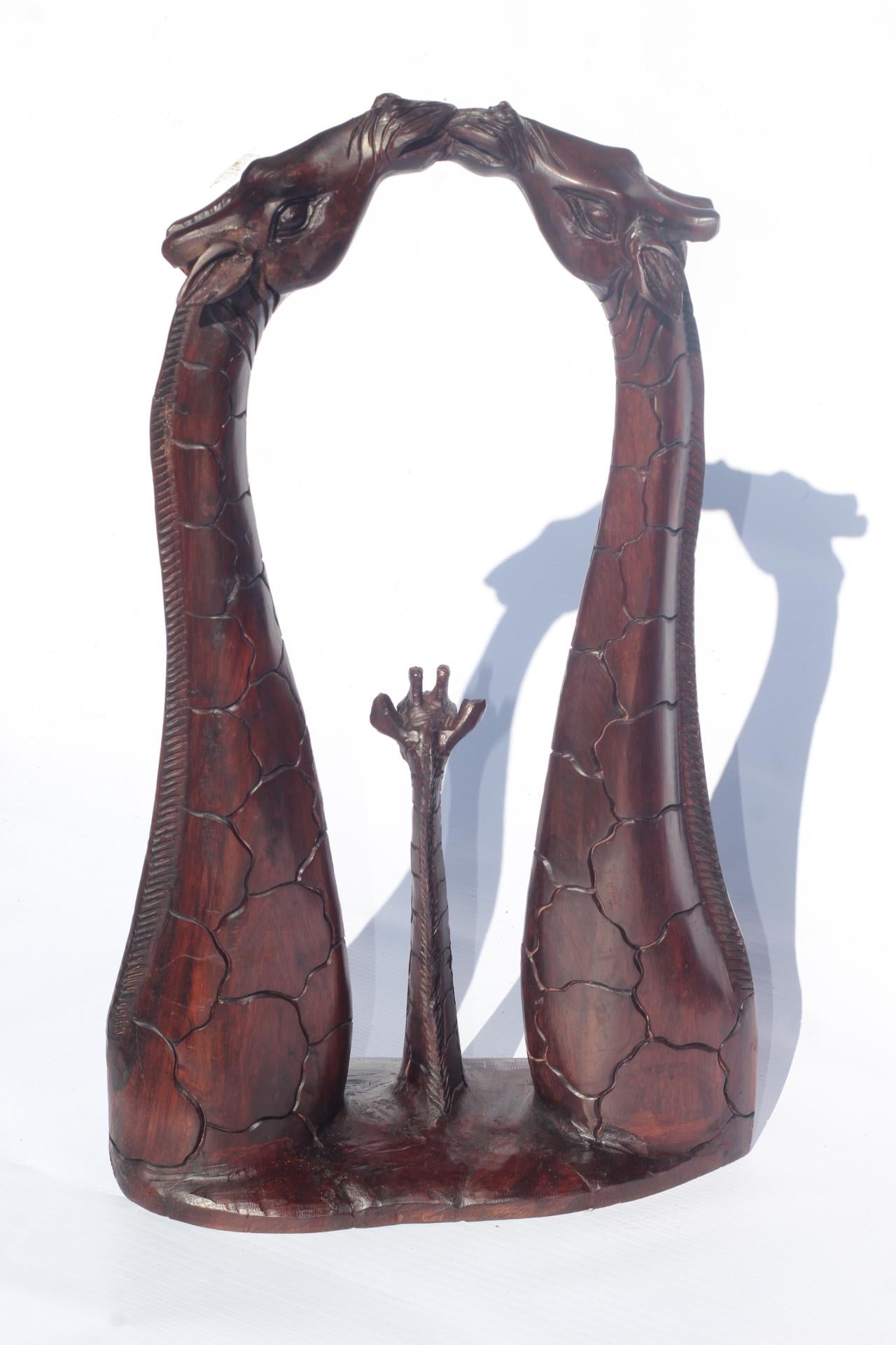 Fine Art Giraffe Necks Lovers, kissing with a calf. Zimbabwean handcarved Iron Wood Sculpture. Home/office Unique African gifts.