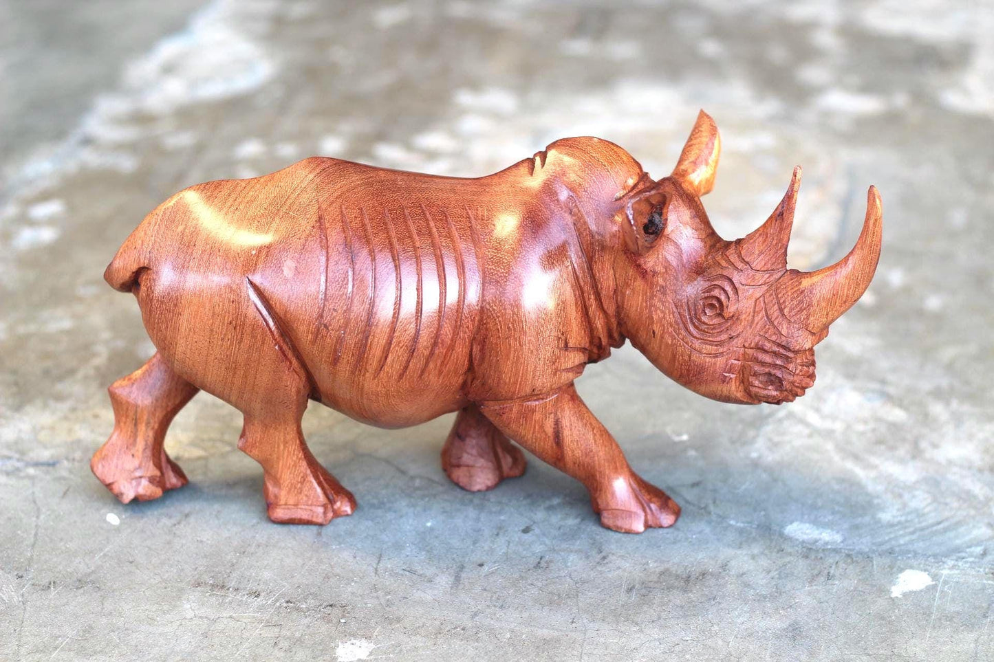 Lifelike Mahogany wood Rhino Figurine. Handcarved light brown, smooth skin walking animal art sculpture. Home and Office Decor Ready to Ship