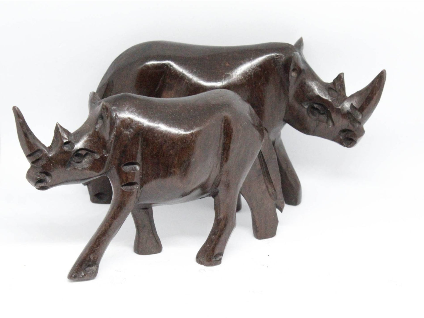 Set of 2 Smooth hand carved Rhino Sculpture. Ebony wood Malawian style Rhinoceros figurines. Unique African animals gifts