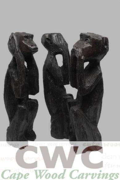 Figurines sculptées à la main en bois d'ébène représentant trois singes sages. Coffret cadeau de décorations d'art africain.