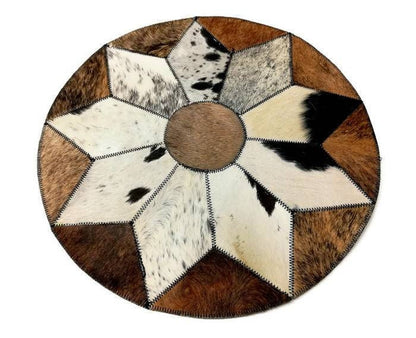 19 inch Nguni Cow Hide Patchwork Rugs. Authentic mixed leather patches, Star pattern on circle design with over lock joining. African Decor