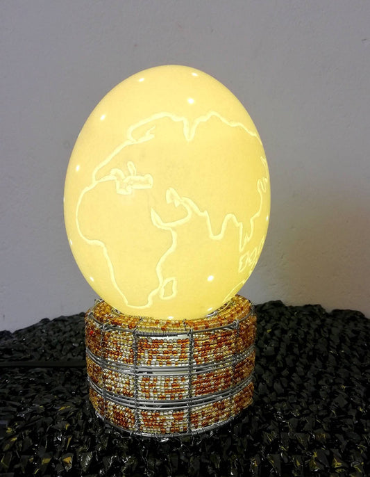 World Map Globe carved on Authentic Ostrich Egg Shell and a beaded brown lamp. Shipping Worldwide from Cape Town South Africa. Home Lighting