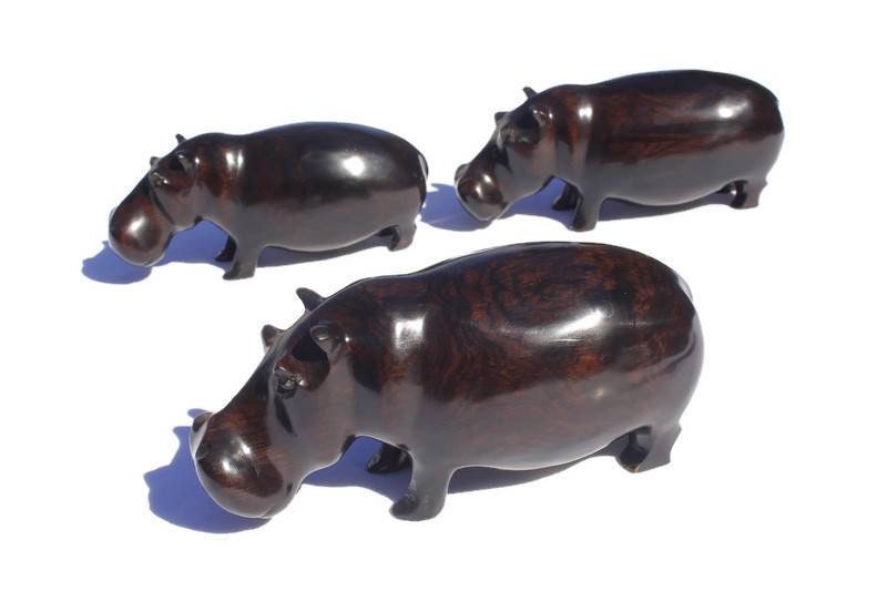 Lifelike Ebony Wood Carved Hippo Sculptures with visible wooden grains in the dark rich wood. Unique African, Christmas /housewarming gifts.