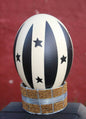 Matt Black Painted Ostrich Egg with Stars on Beaded Gold Stand. Unique African Gifts Shipping worldwide.