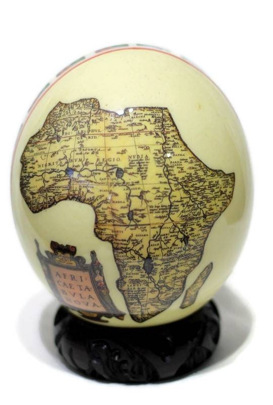 Nelson Mandela Ostrich Egg Decoupage with South African flags and Africa Map on a clear background Egg Shell background. Christmas gifts art