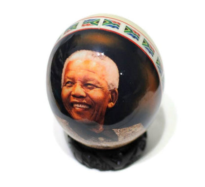 Nelson Mandela Ostrich Egg Decoupage with South African flags and Africa Map on a clear background Egg Shell background. Christmas gifts art