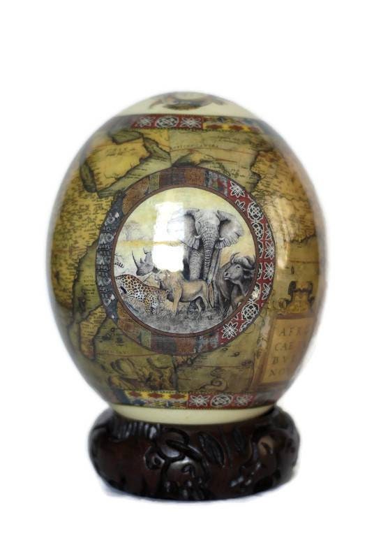 Brown Ostrich Egg Decoupage Art for home and office decoration gifts. Has African Map and big 5 Animals. Comes with a Carved Wood Ring stand