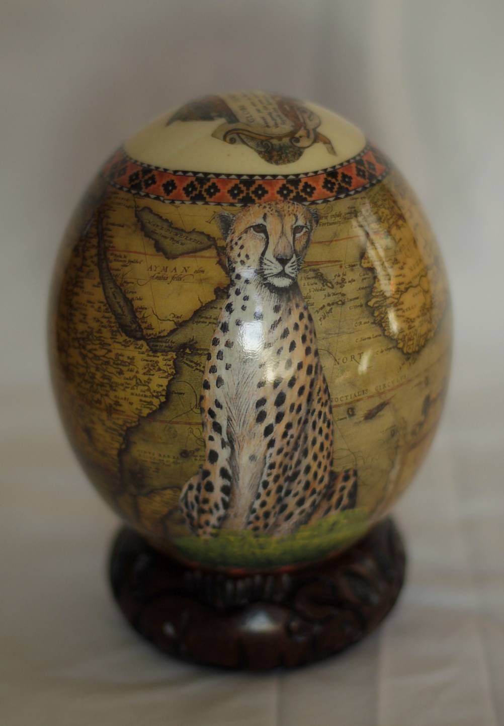 Ostrich Egg Decoupage Seating Cheetah with African Map Background. Comes with a Carved Wood stand. Art gifts Express Shipping Worldwide