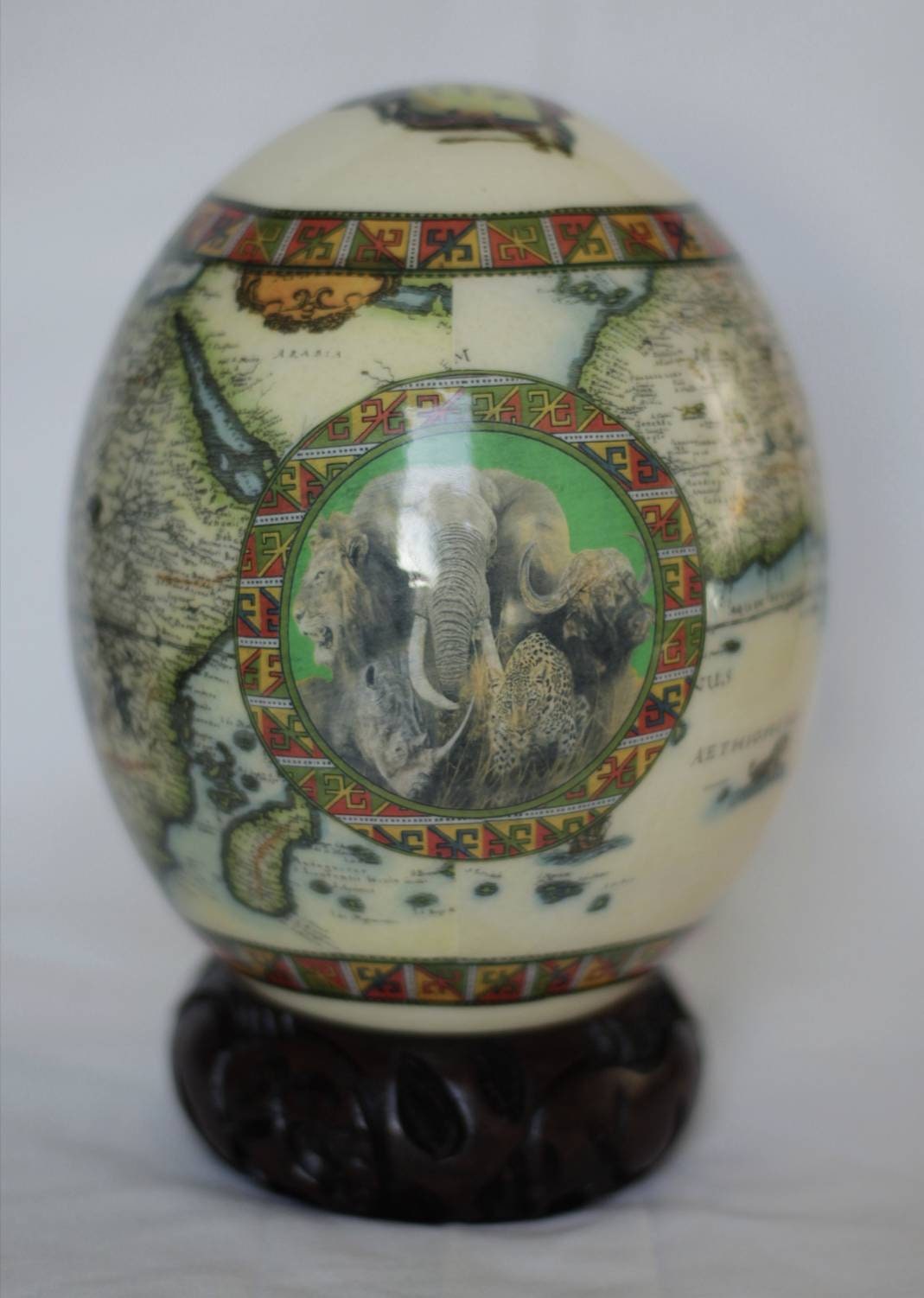 Green African Map Decoupage Ostrich Egg Shell with Big Five Animals on a green background circle. Express Shipping Worldwide. Art gifts