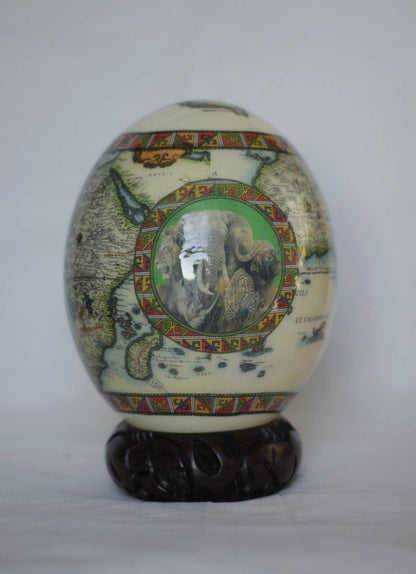 Green African Map Decoupage Ostrich Egg Shell with Big Five Animals on a green background circle. Express Shipping Worldwide. Art gifts