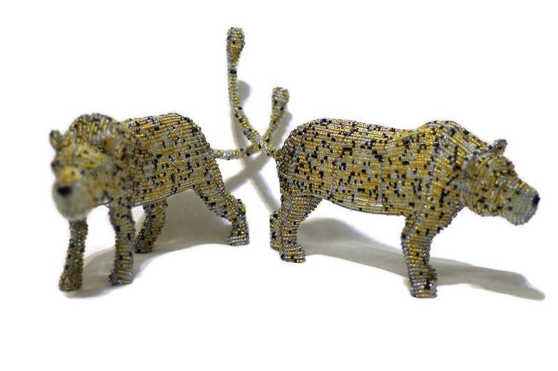 Light brown, clear and black beaded Leopard figurines by Job Guwhe. Express Shipping Worldwide, custom Orders Welcome. Walking big cat art