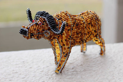 Beaded Water Buffalo figurines by Job Guwhe. Handmade Gold, brown, black beads and wire animals. Home / Office Decor Ready to Ship Express