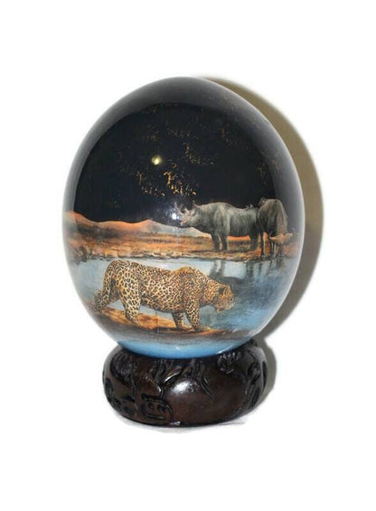 The African Big 5 Animals on the Waterhole at night, Ostrich Egg Decoupage Art. Comes with a Carved Wood Ring stand.  Ready to Ship Express