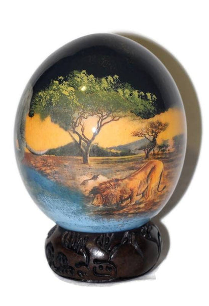 The African Big 5 Animals on the Waterhole at night, Ostrich Egg Decoupage Art. Comes with a Carved Wood Ring stand.  Ready to Ship Express