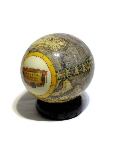 Africae Nova Descriptio Map on Ostrich Egg Decoupage Art. This is an amazing gift for home or offic Decor. Medium sized on ebony wood Stand.