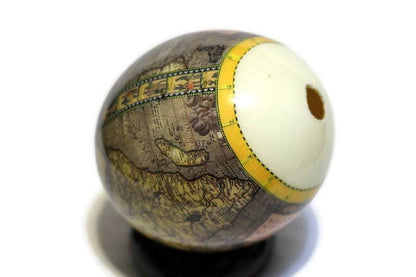 Africae Nova Descriptio Map on Ostrich Egg Decoupage Art. This is an amazing gift for home or offic Decor. Medium sized on ebony wood Stand.