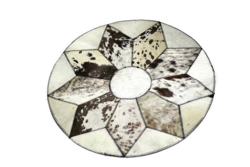 19 inch Nguni Cow Hide Patchwork Rugs. Authentic mixed leather patches, Star pattern on circle design with over lock joining. African Decor