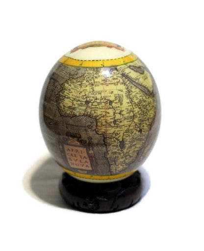 Africae Nova Descriptio Map on Ostrich Egg Decoupage Art. This is an amazing gift for home or offic Decor. Medium sized on ebony wood Stand.