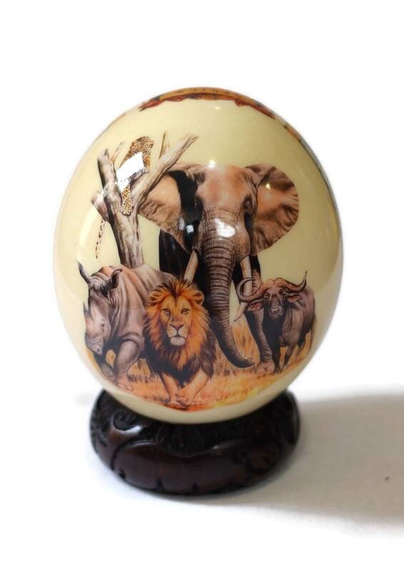 African Big Five Decoupage Shell. Ostrich Egg with big 5 Animals and African Map with protea flowers on a clear background. Express Shipping