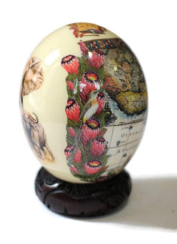 African Big Five Decoupage Shell. Ostrich Egg with big 5 Animals and African Map with protea flowers on a clear background. Express Shipping