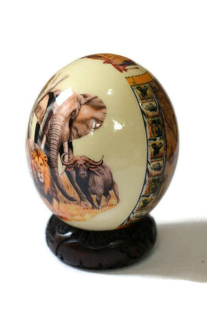 African Big Five Decoupage Shell. Ostrich Egg with big 5 Animals and African Map with protea flowers on a clear background. Express Shipping