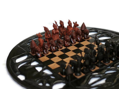 20inch Ebony and Olive Wood African Carved Chess set. Giraffes, Rhino,  Elephant cuttings board. Ebony and Zebra Wood Zulu Warriors Pieces.