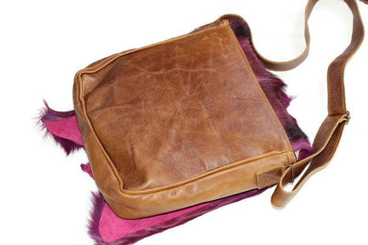 Premium Leather Antelope Hide Sling bag. Purple dyed fur with brown back and Strap. Springbok handbag/Messenger bag ready to Ship Express