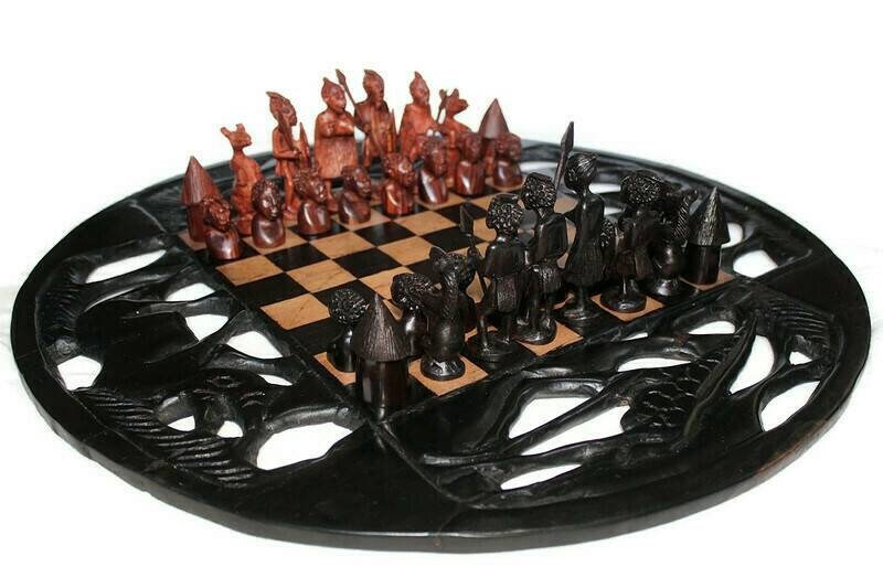 20inch Ebony and Olive Wood Carved Chess set. Giraffes, Rhino,  Elephant cuttings on the board. Ebony and Zebra Wood Zulu Warriors Pieces.