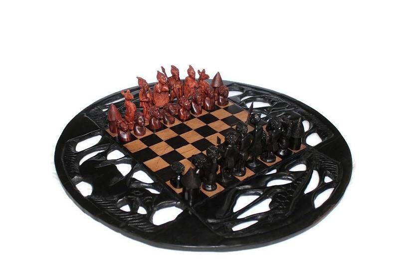 20inch Ebony and Olive Wood Carved Chess set. Giraffes, Rhino,  Elephant cuttings on the board. Ebony and Zebra Wood Zulu Warriors Pieces.