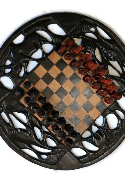 20inch Ebony and Olive Wood Carved Chess set. Giraffes, Rhino,  Elephant cuttings on the board. Ebony and Zebra Wood Zulu Warriors Pieces.