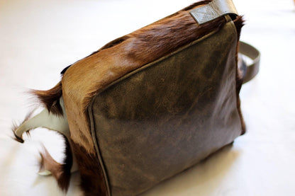 Premium Leather Antelope Hide Sling bag gift. Brown fur with brown back and Strap. Original color from a Rare South African Black Springbok.