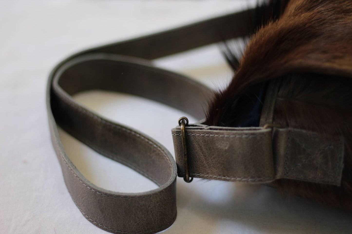 Premium Leather Antelope Hide Sling bag gift. Brown fur with brown back and Strap. Original color from a Rare South African Black Springbok.