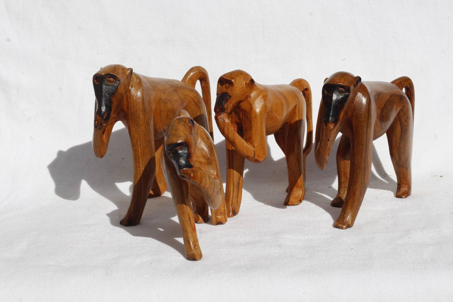 Family of 4 Olive wood Walking/Eating baboon/monkey carved sculptures. Polished Brown hand carved wooden figurines. African Art Gifts