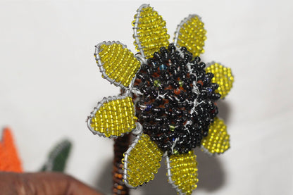 Set of 7 Beaded Flowers by Job Guwhe. 2 Roses, 2 Peace Lillies, 1 Sunflower, 1 White Daffodil, 1 Strelitzia/Bird of Paradise. African Decor