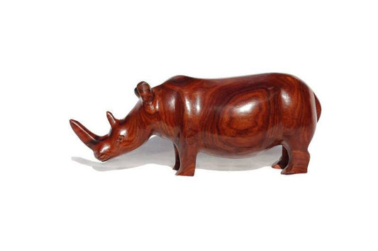 Zambian Teak wood Rhino Sculpture. Handcarved Rhinoceros figurines made from a reddish brown Wood with amazing visible grains. Ships Express