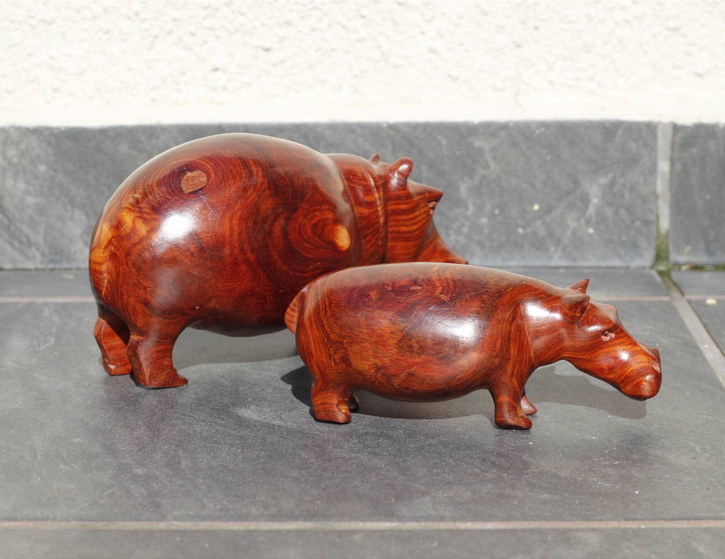 Teak Wood Carved Hippo Sculptures. Zambian style lifelike figurines shipping Worldwide from Cape Town South Africa. Unique gift items