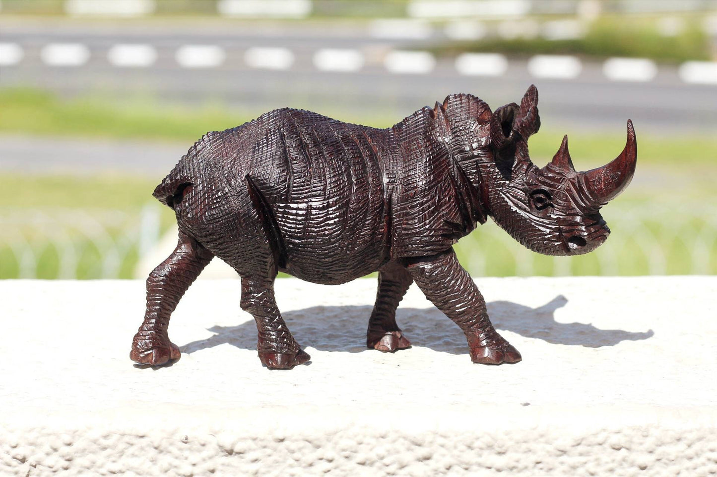 Lifelike fully detailed Ironwood Rhino Figurine. Handcarved rough skin walking animal art sculpture. Home and Office Decor Express Shipping