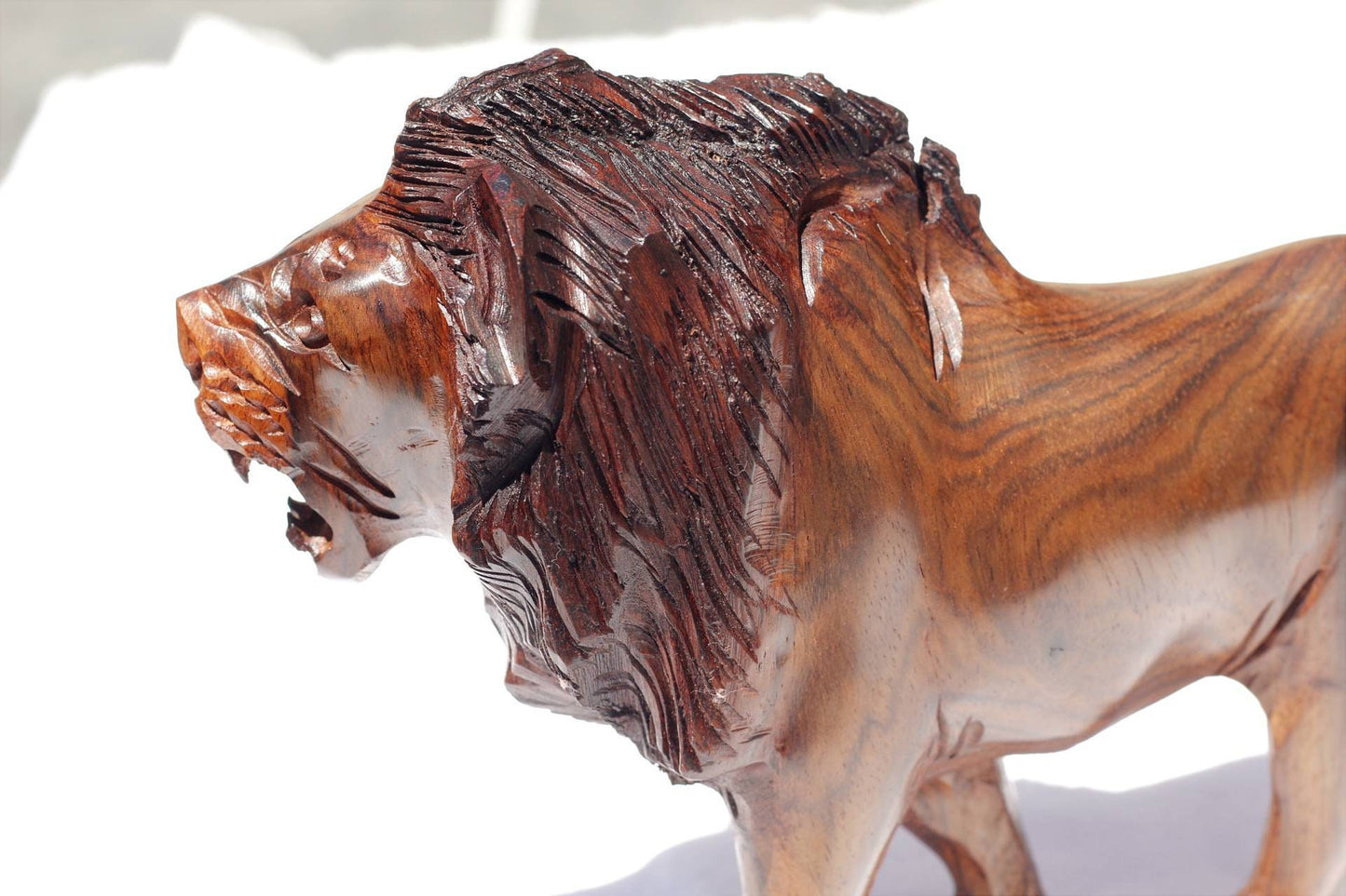 Fine Art Lion King Handcarved Ironwood Masterpiece. Walking Lifelike figurine. Smooth carving visible grain Zimbabwean made. Christmas gifts