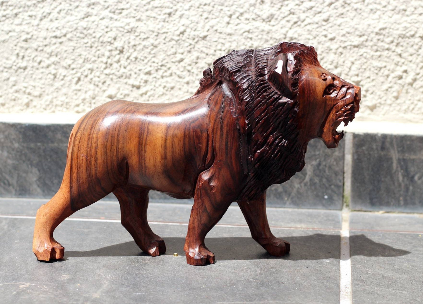 Fine Art Lion King Handcarved Ironwood Masterpiece. Walking Lifelike figurine. Smooth carving visible grain Zimbabwean made. Christmas gifts