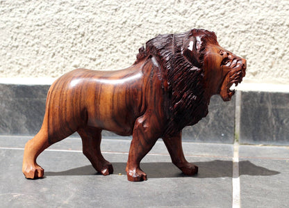 Fine Art Lion King Handcarved Ironwood Masterpiece. Walking Lifelike figurine. Smooth carving visible grain Zimbabwean made. Christmas gifts