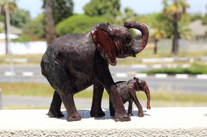 Mother Elephant and Calf Ironwood Sculpture. Zimbabwean handmade fully detailed lifelike figurines. African Big Five gifts Shipping Express