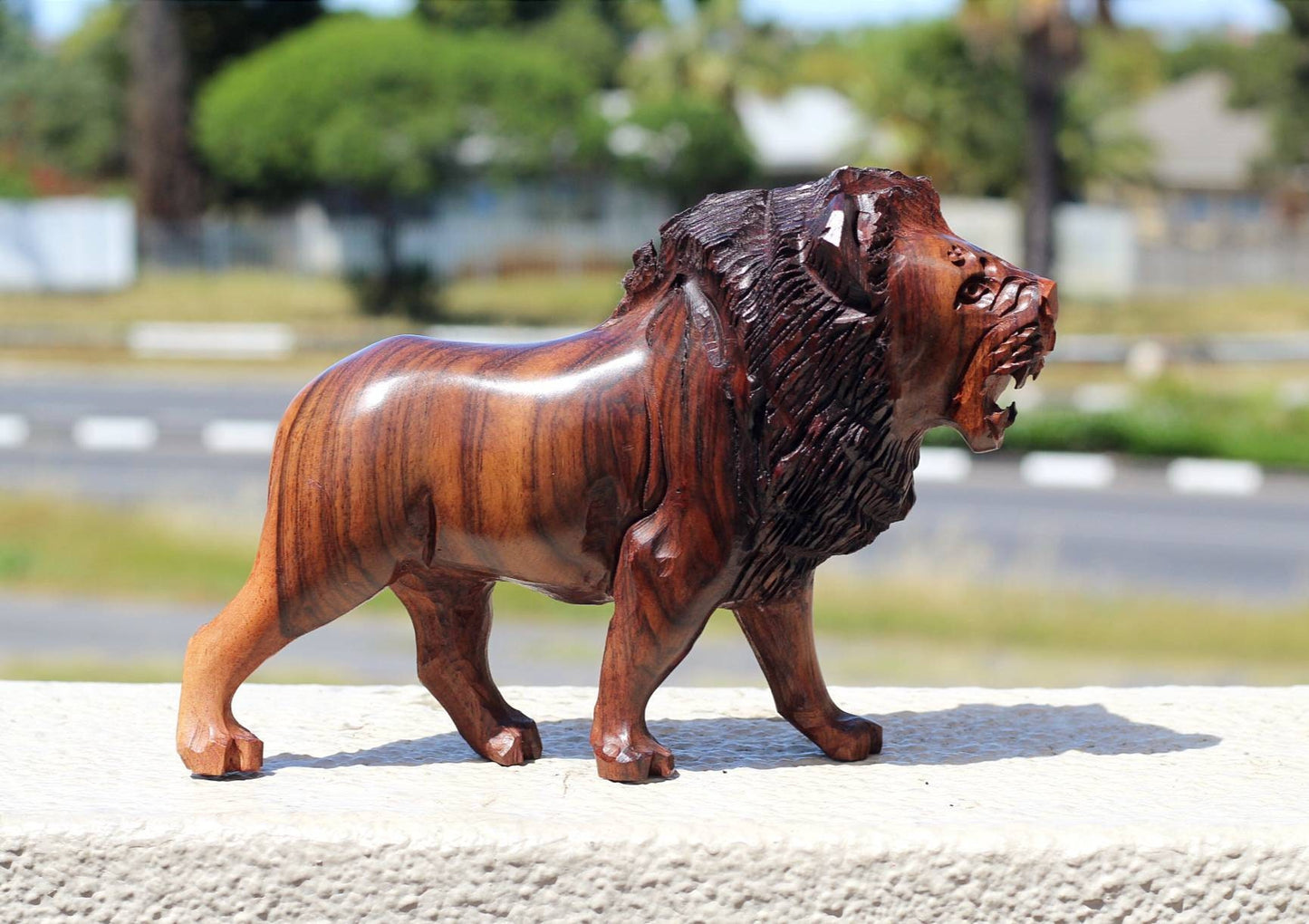 Fine Art Lion King Handcarved Ironwood Masterpiece. Walking Lifelike figurine. Smooth carving visible grain Zimbabwean made. Christmas gifts