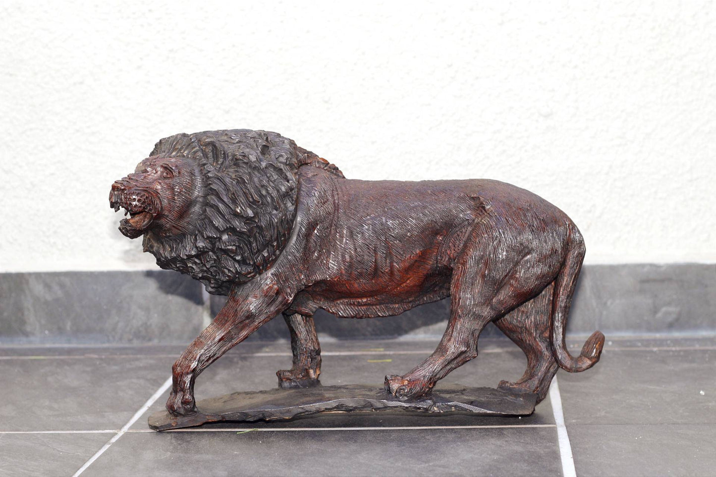 Large Handcarved lion Iron wood figurine. Dark Brown African hardwood walking animal Sculpture with base. Unique handmade Gift from Zimbabwe