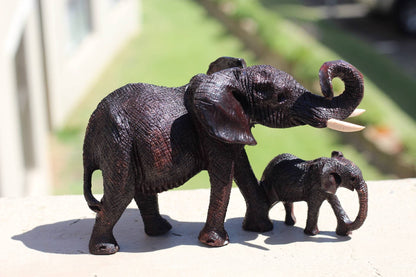 Charging Mother Elephant and Calf Ironwood Sculpture. Zimbabwean hand carved fully detailed lifelike figurines. African Big 5 Fine Art Gifts